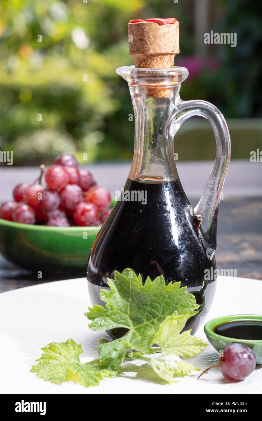 Black aged natural balsamic vinegar dressing from Modena, Italy Stock