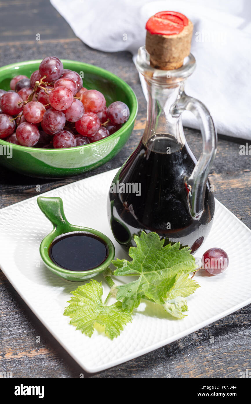 Black aged natural balsamic vinegar dressing from Modena, Italy Stock