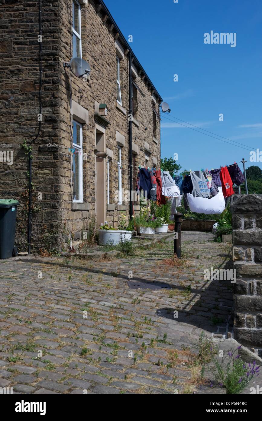 Clothes hang out to dry in the high temperatures in New Mills