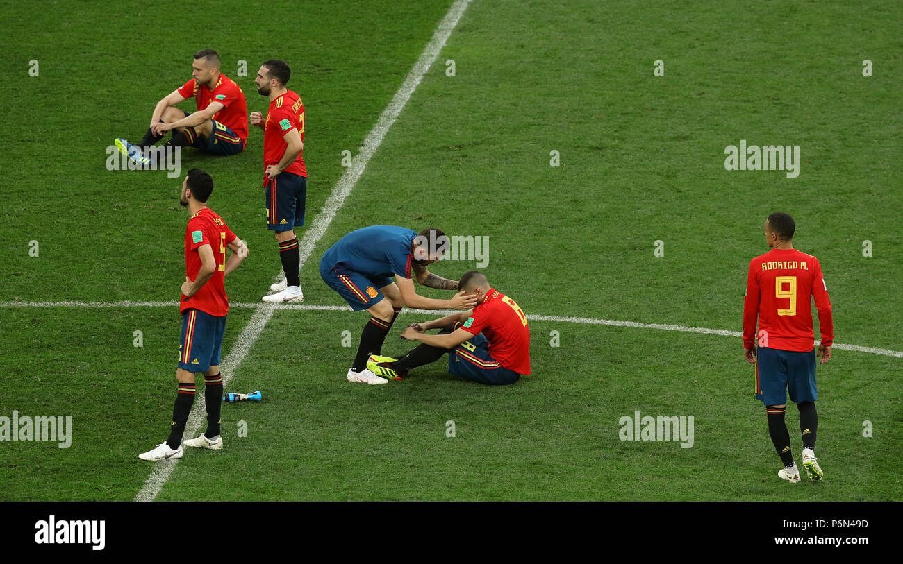 Spain's Koke is comforted by team-mate after the final whistle of the penalty shoot-out during the FIFA World Cup 2018, round of sixteen match at The Luzhniki Stadium, Moscow. Stock Photo