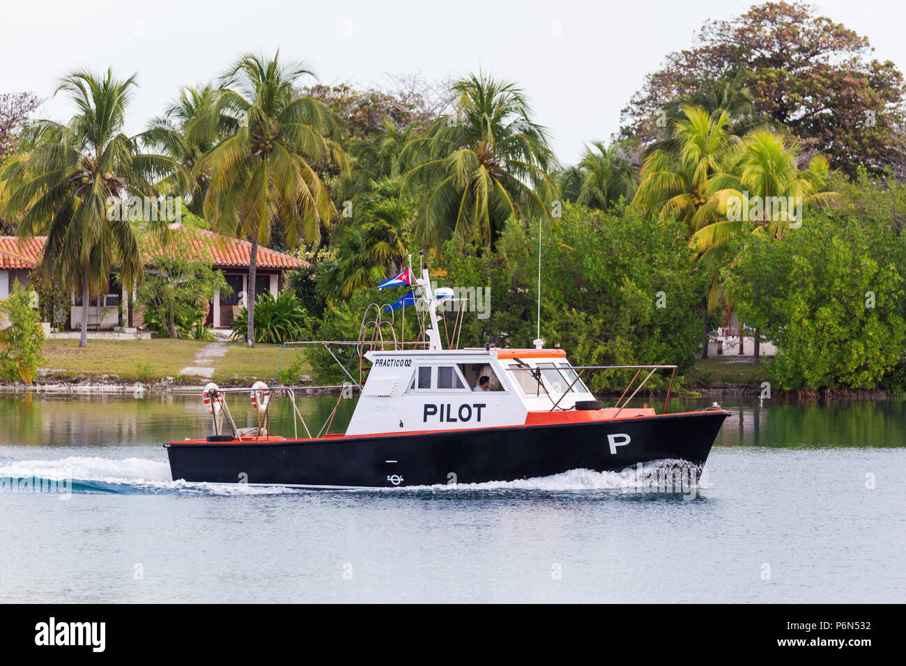 Pilot boat in the harbor at Cayo Largo on the southern coastline of Cuba. Stock Photo