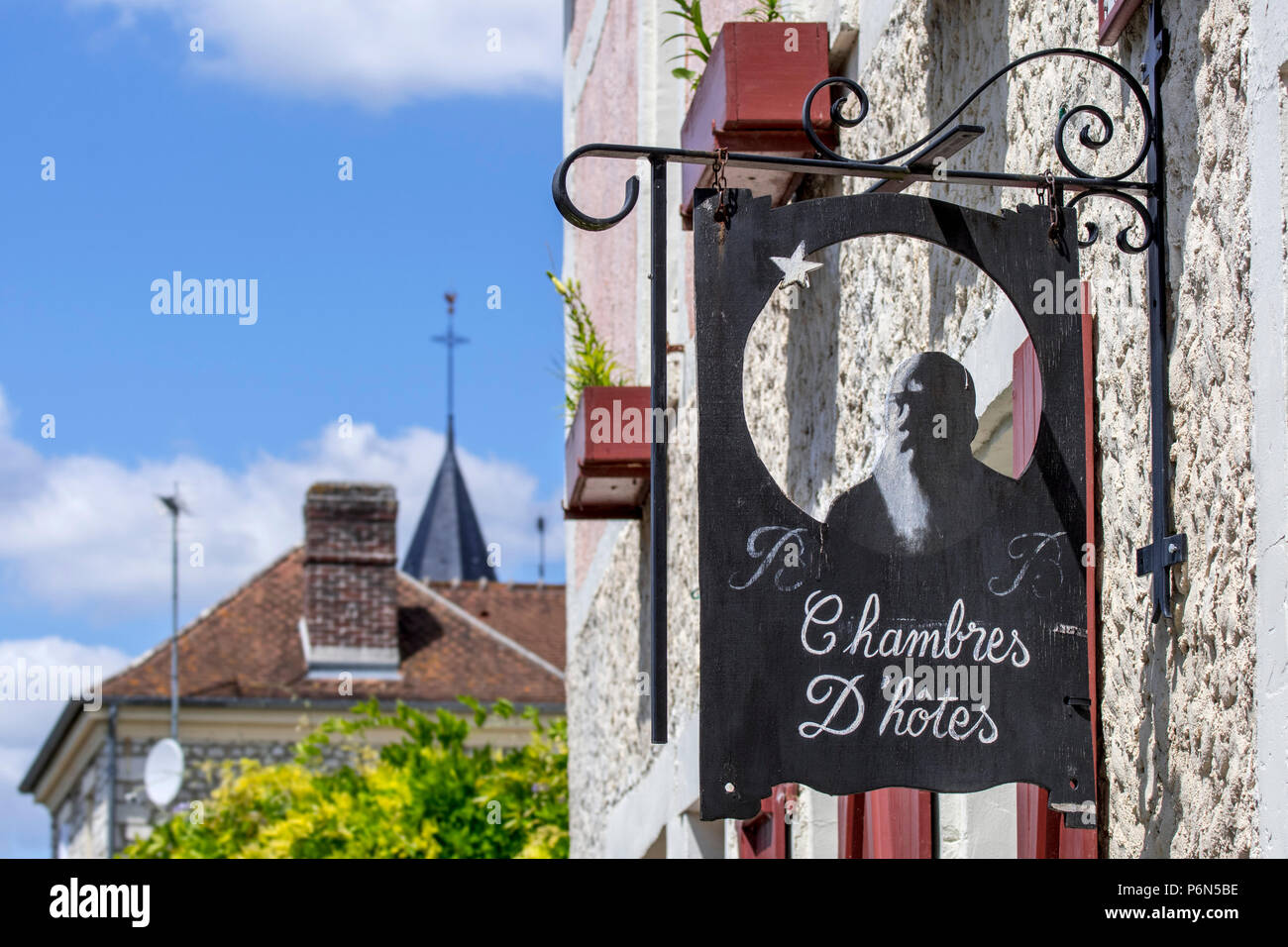 Sign showing silhouette of Impressionist painter Claude Monet at Le Coin des Artistes, chambre d'hôtes at Giverny, Eure department, Normandy, France Stock Photo