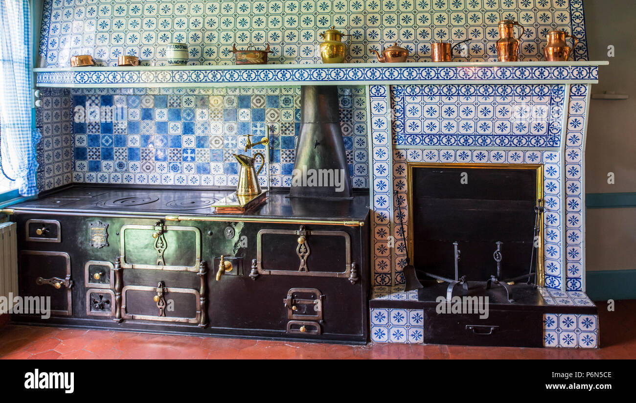 Bluetiled kitchen in the house of Claude painter and founder of