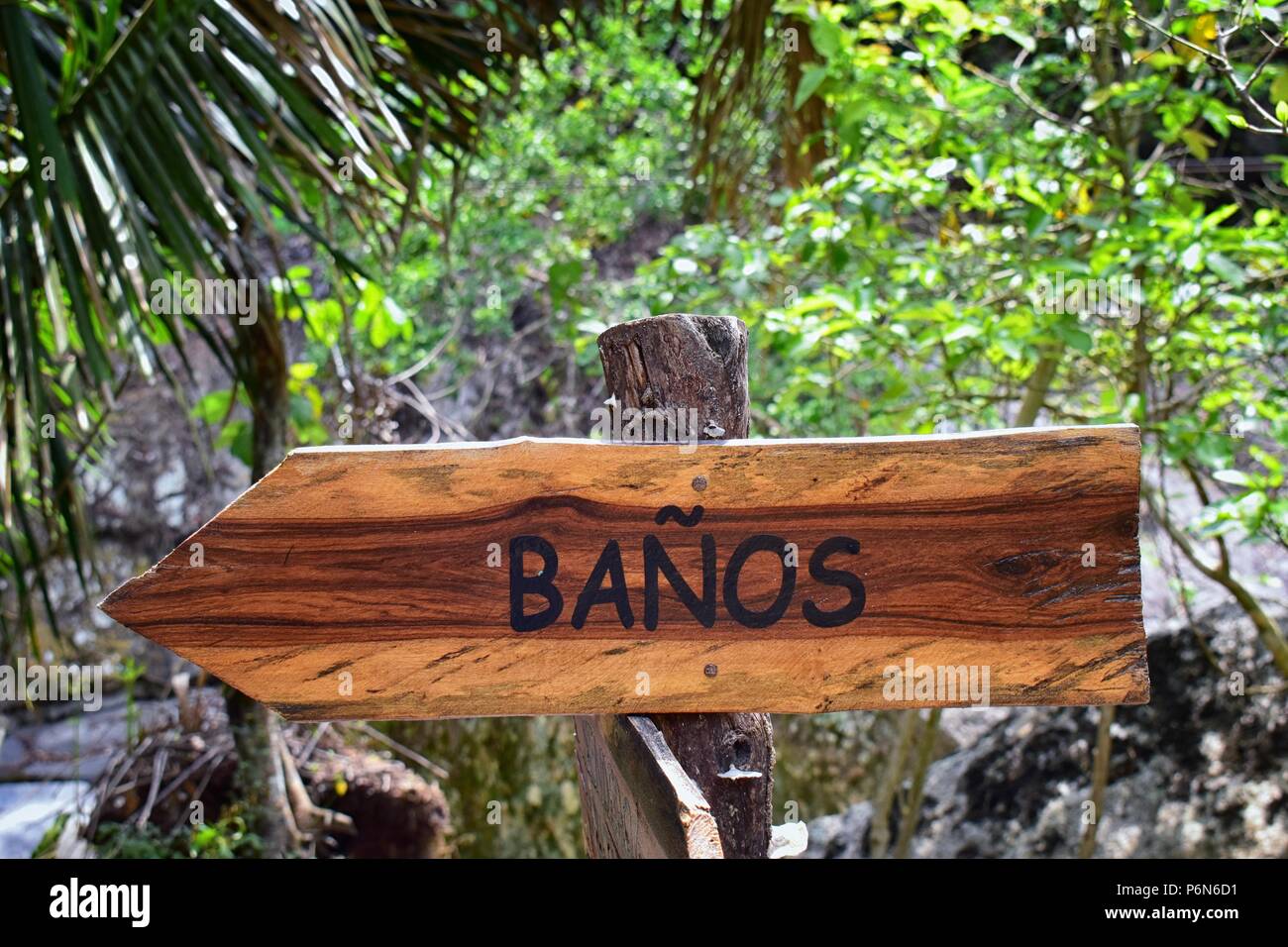 Banos, Bathroom Sign on the trail in El Eden by Puerto Vallarta Mexico where movies have been filmed. Stock Photo