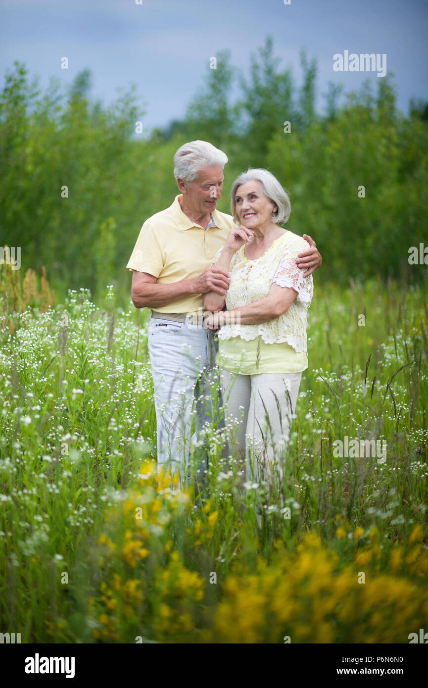 mature couple   in summer park Stock Photo