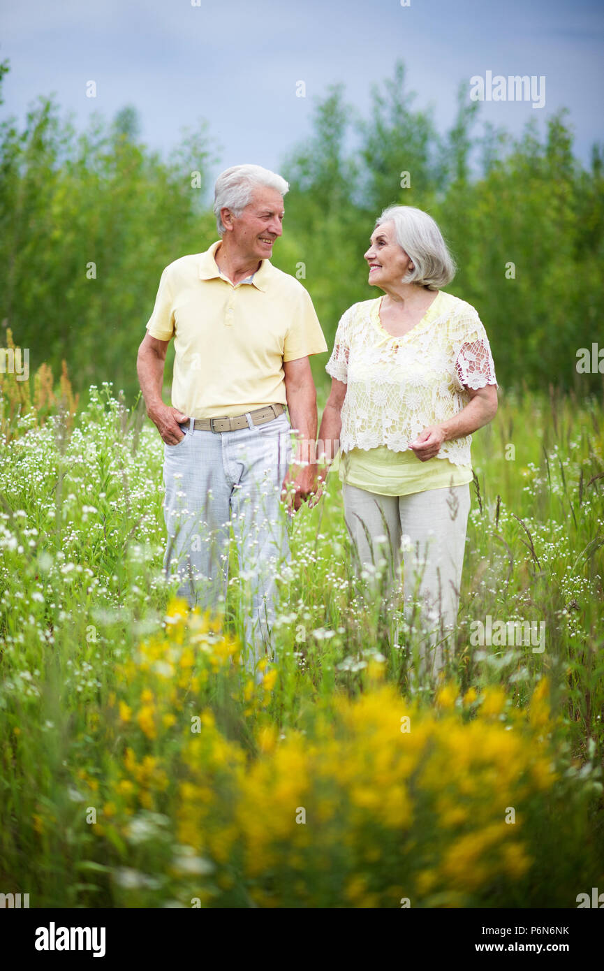 mature couple   in summer park Stock Photo