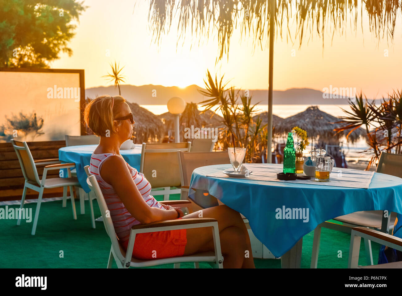 Mature woman alone restaurant hi-res stock photography and images - Alamy