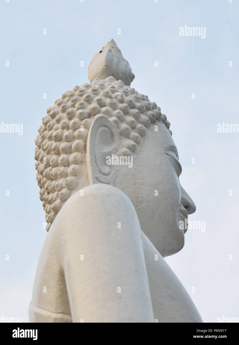 White Buddha statue and blue sky Stock Photo - Alamy