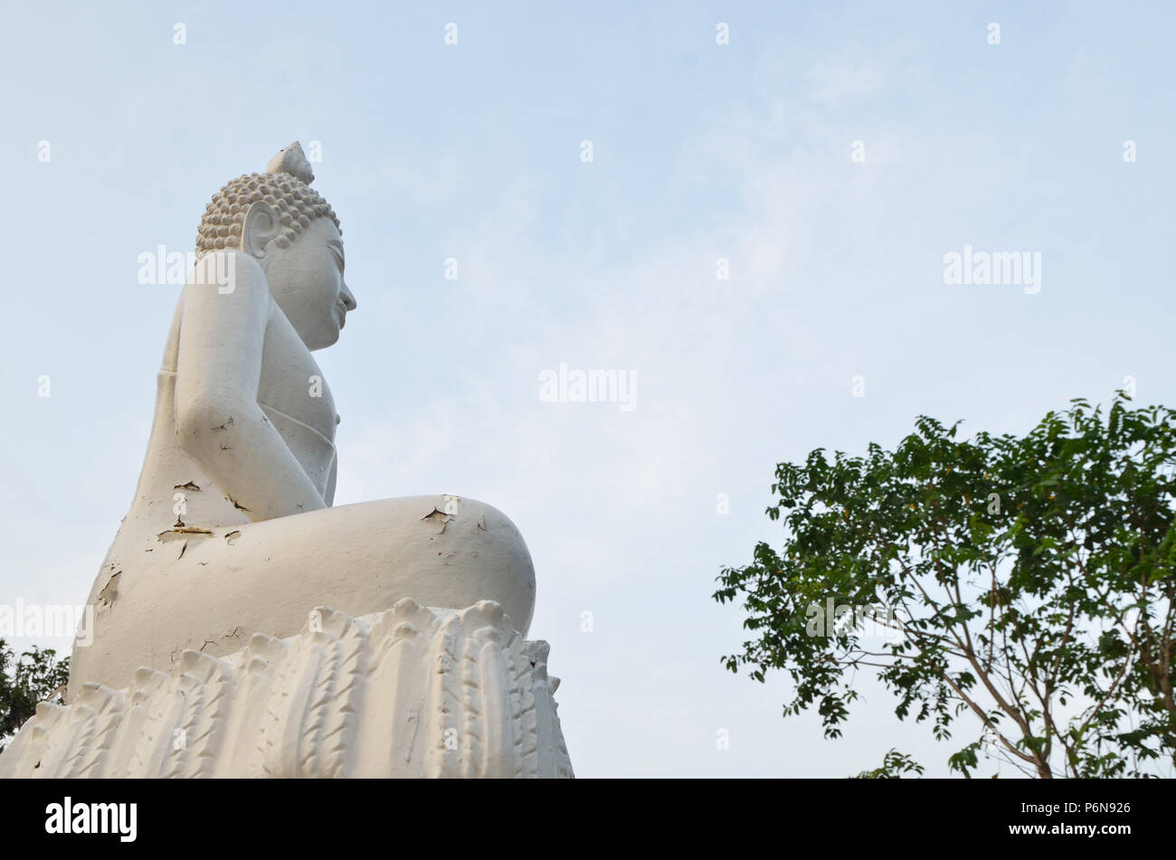 White Buddha statue and blue sky Stock Photo - Alamy