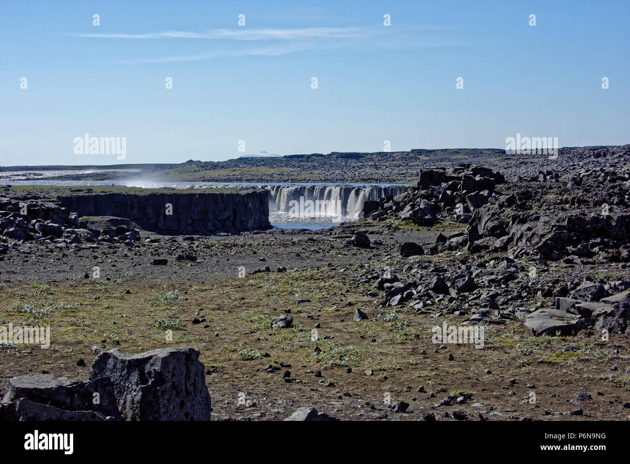 Dettifoss Europe s largest waterfall on Jokulsa a Fjollum River Iceland Polar Regions.Tourists on Trail to Dettifoss Waterfall in Vatnajokull National Stock Photo