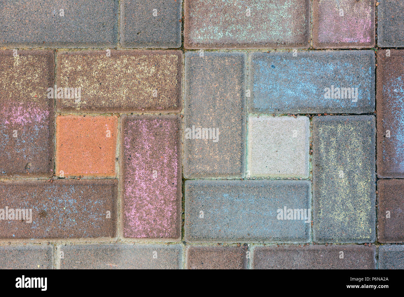 Pavement tile painted with colorful chalks. Children drawing on street ...