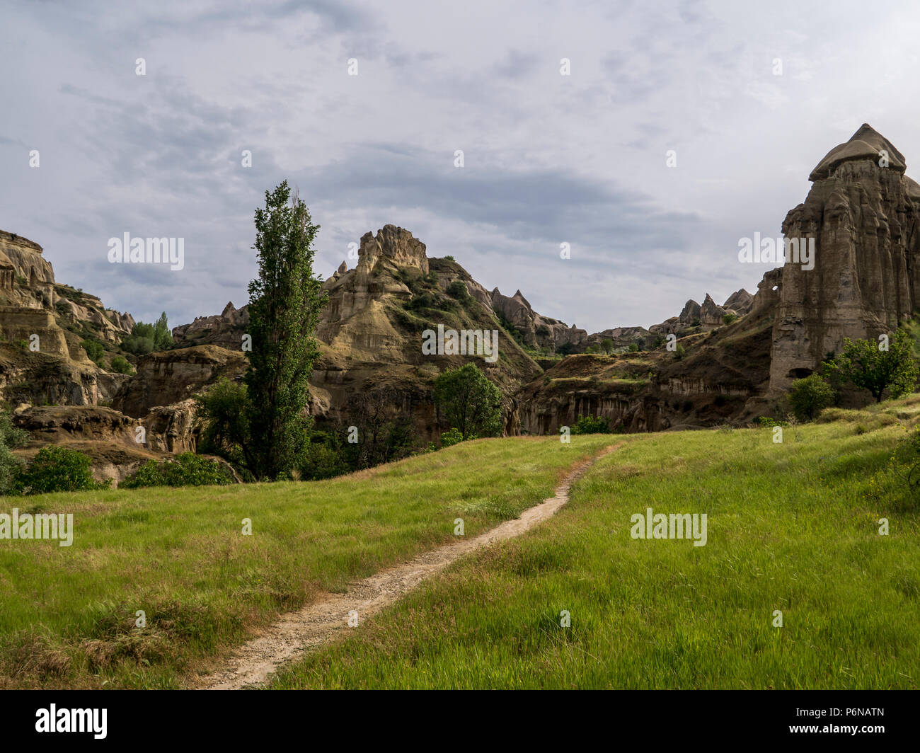 Trail to Alien Cave house of Fairy Chimneys rocks mushroom in Pasabag ...