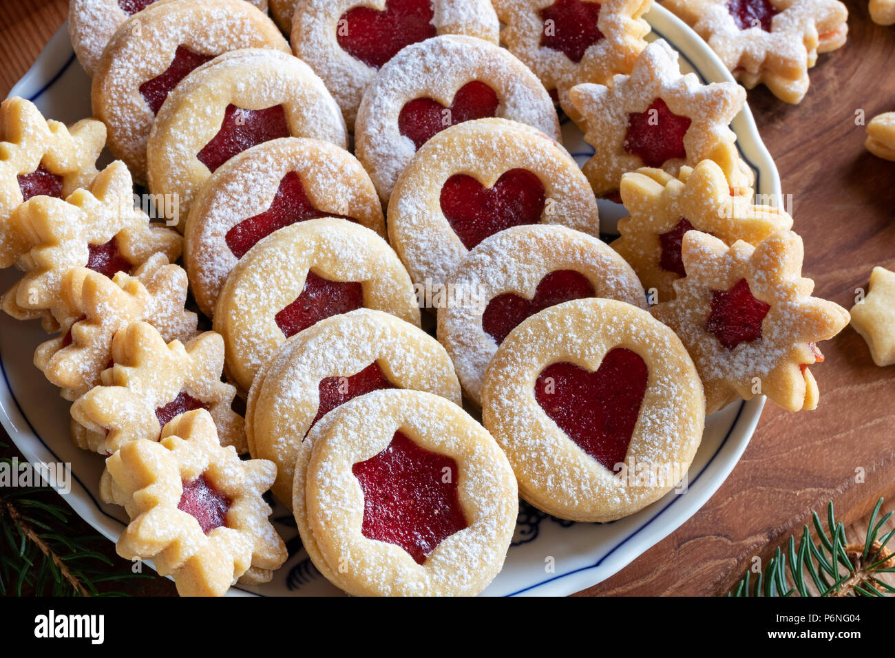 Traditional Linzer Christmas cookies filled with strawberry jam Stock ...