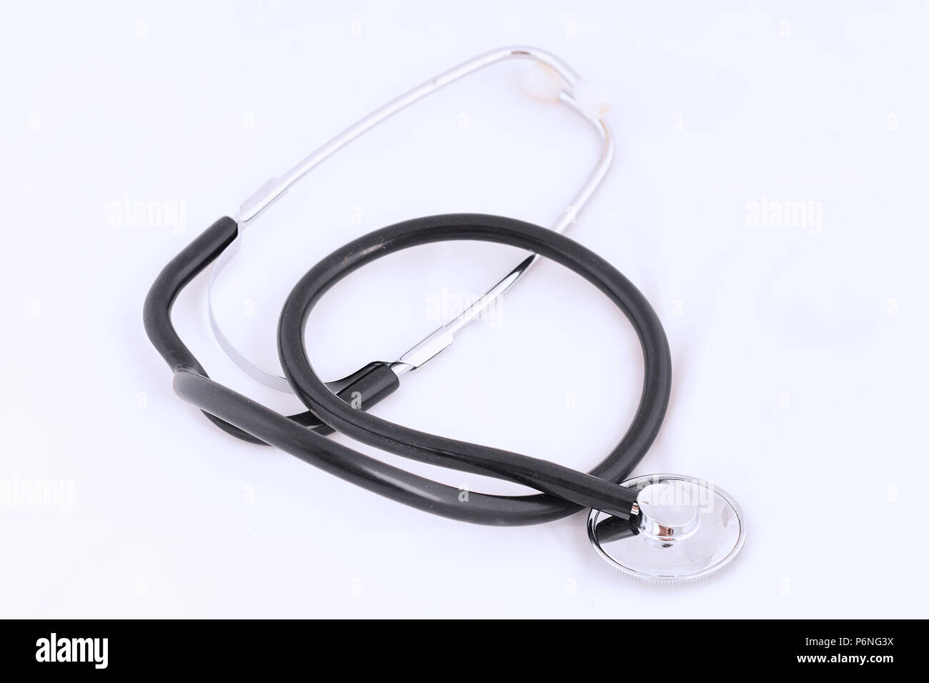 Close up view of black stethoscope. Medicine concept. Isolated white ...