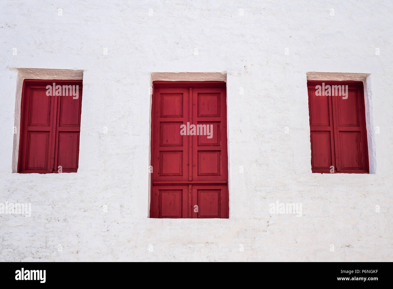 Traditional red wooden window shutters in Bodrum, Turkey Stock Photo