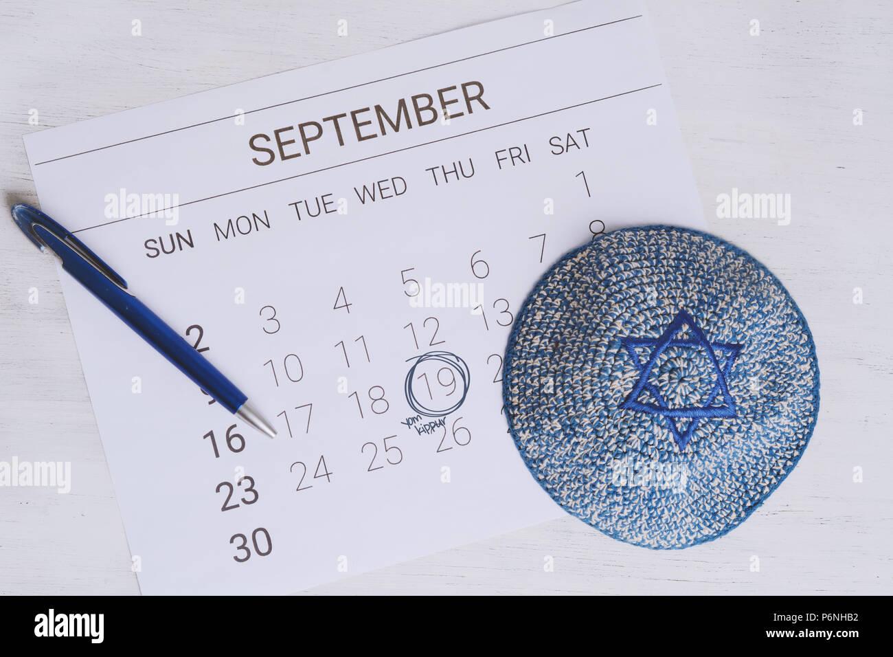 Calendar with kippah. Calendar with date September 19. Yom kippur