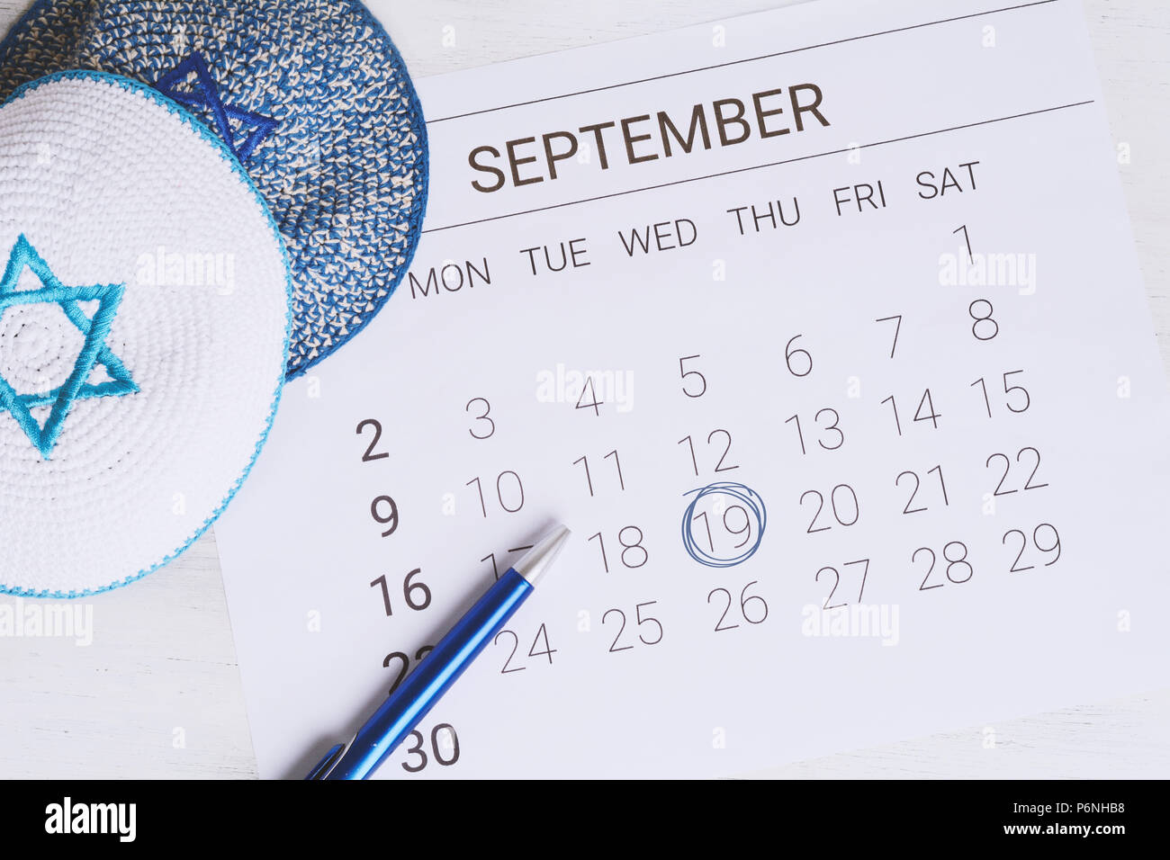 Calendar with kippah. Calendar with date September 19. Yom kippur