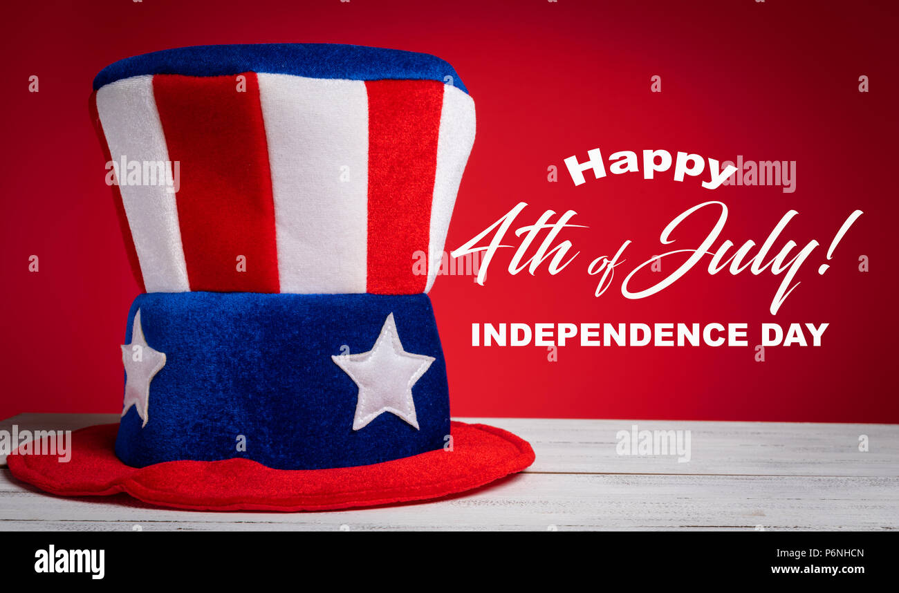 Uncle Sam hat on red background with Happy July 4th greeting Stock ...