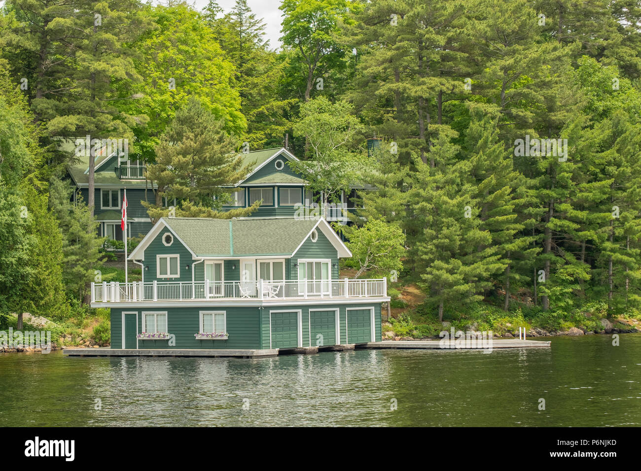 Beautiful summer cottage located on Lake Muskoka in Ontario Canada. Stock Photo