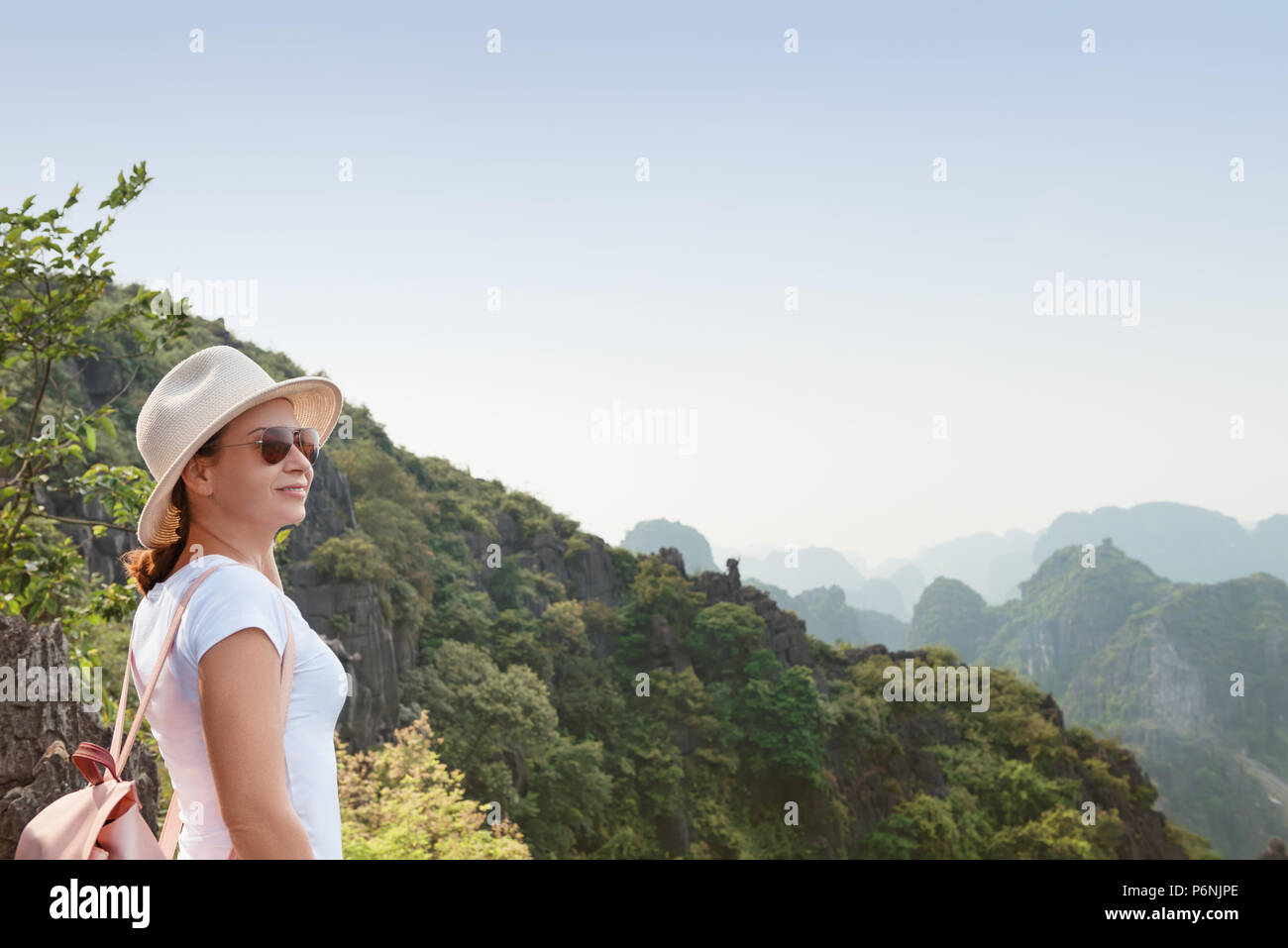Woman tourist on top mountain hi-res stock photography and images - Alamy