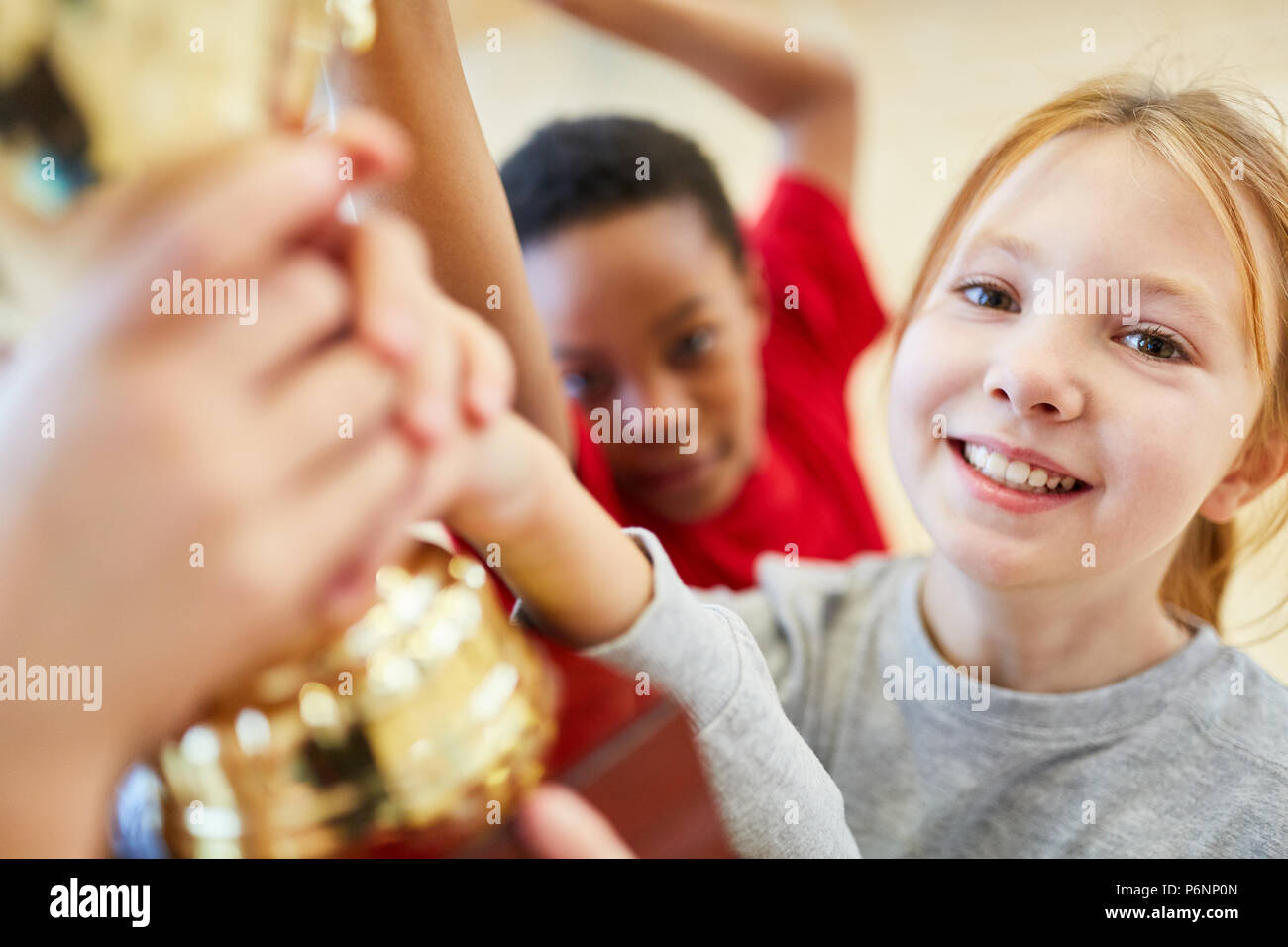 Girl at an award ceremony after a competition in elementary school