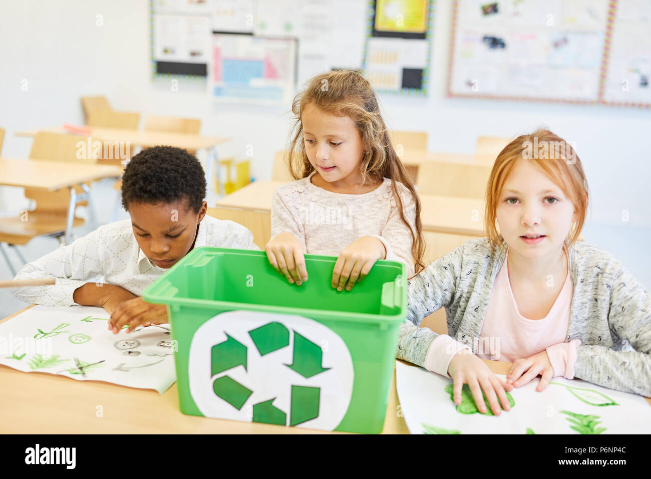 Children in elementary school in the classroom are working on an ecology project Stock Photo Alamy