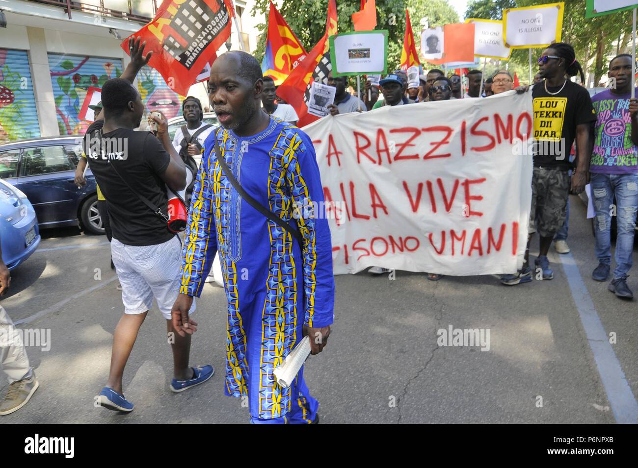 Milan, June 9, 2018, protest demonstration by migrants for the murder in the plain of Gioia Tauro, in Calabria, of Soumaila Sacko, African immigrant from Mali, agricultural worker and trade unionist of the independent union USB Stock Photo