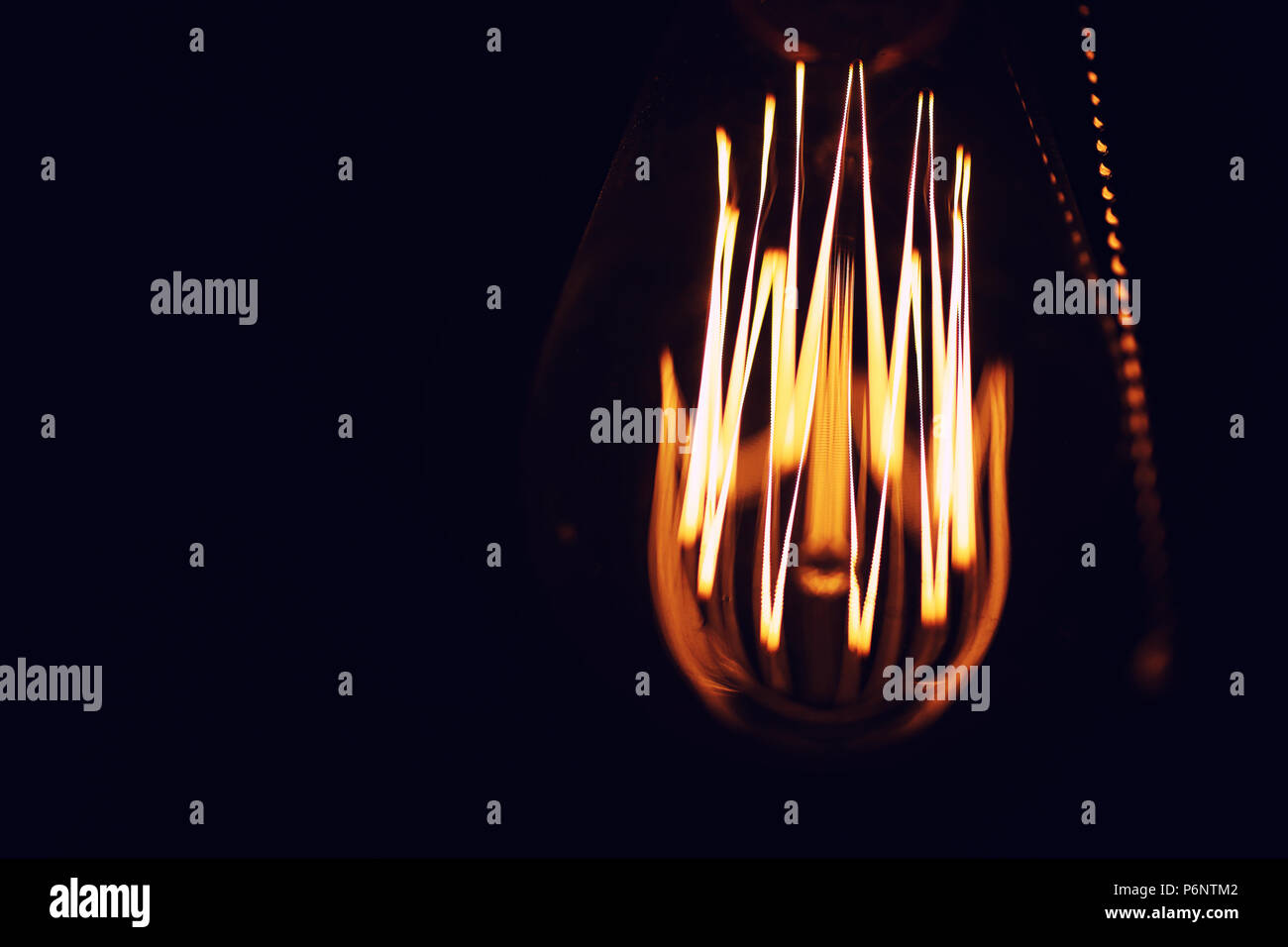 Lamps with tungsten filament. Edison light bulb. Filament filament in