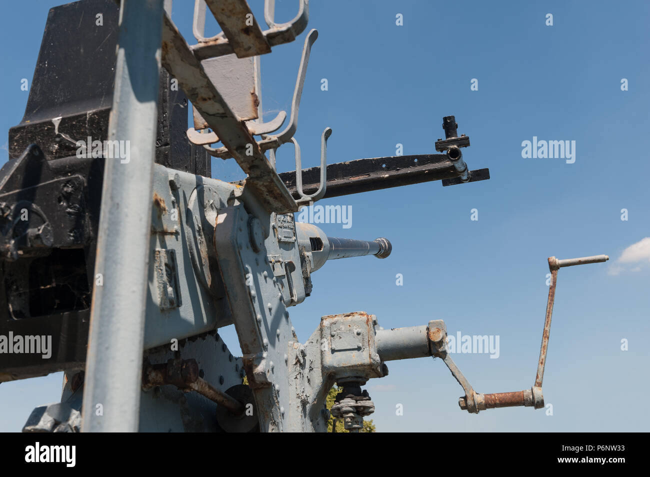 Second World War Bofors 40 mm anti-aircraft gun pointing towards a blue sky used for air defences Stock Photo