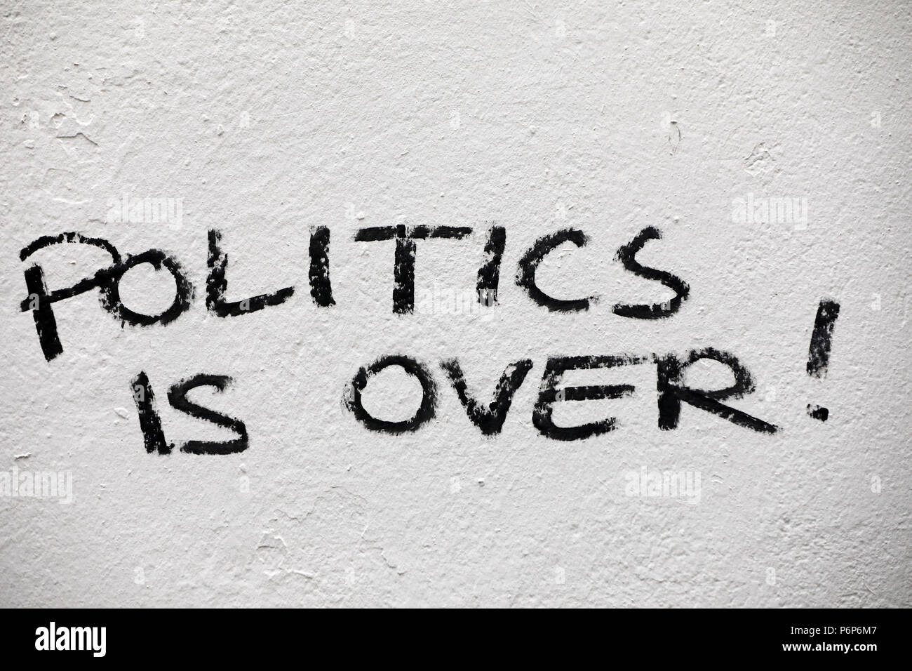 Graffiti on a wall. Politics is over !  Basel. Switzerland. Stock Photo