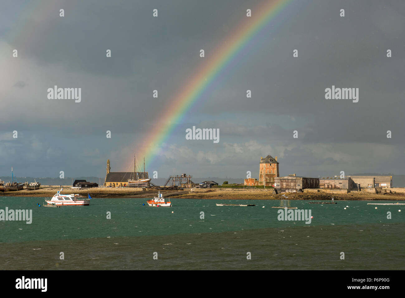 Rainbow over Notre dame de Rocamadour church, Camaret, France. Stock Photo