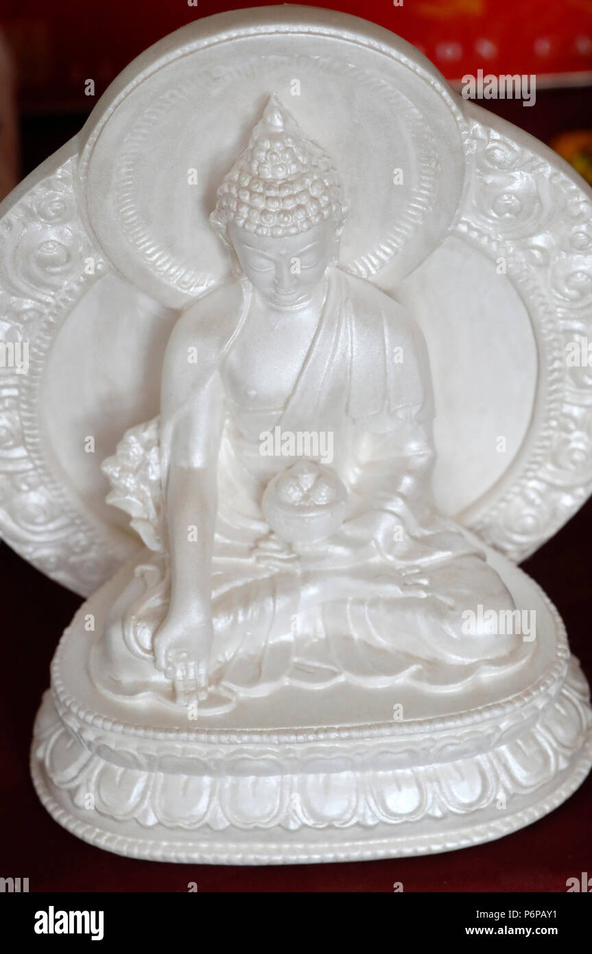 Bhai ajyaguru  is the Buddha of healing and medicine in Mahayana Buddhism. Saint-Pierre en Faucigny. France. Stock Photo