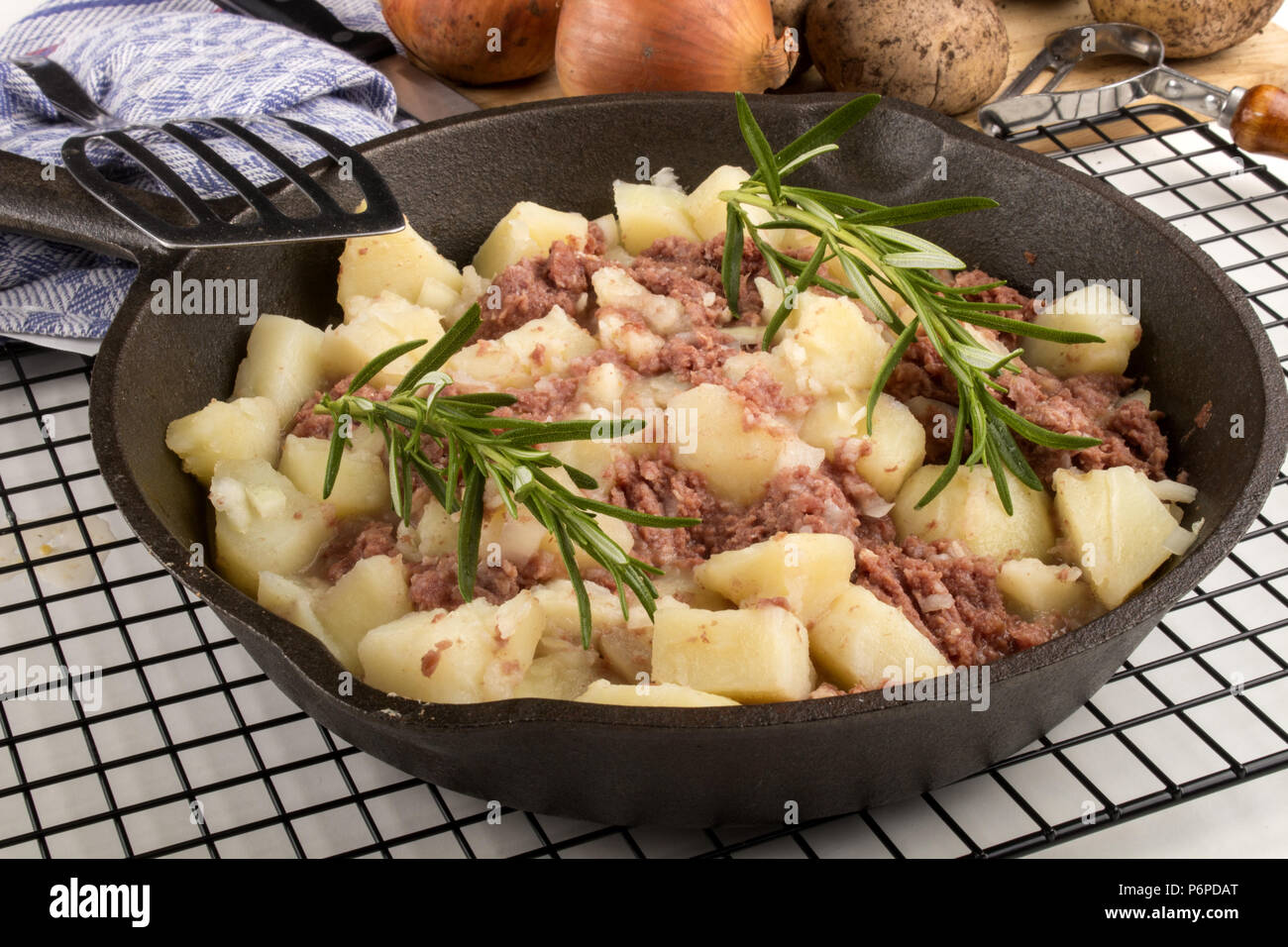 very irish meal, cooked corned beef hash in a cast iron pan with