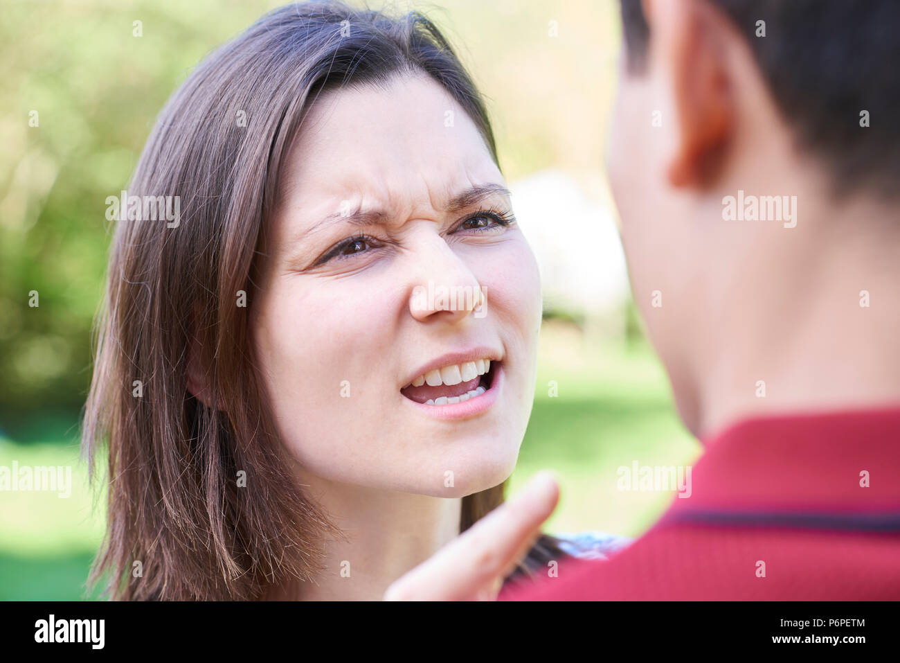 Outdoor Shot Of Young Couple Having Argument Stock Photo