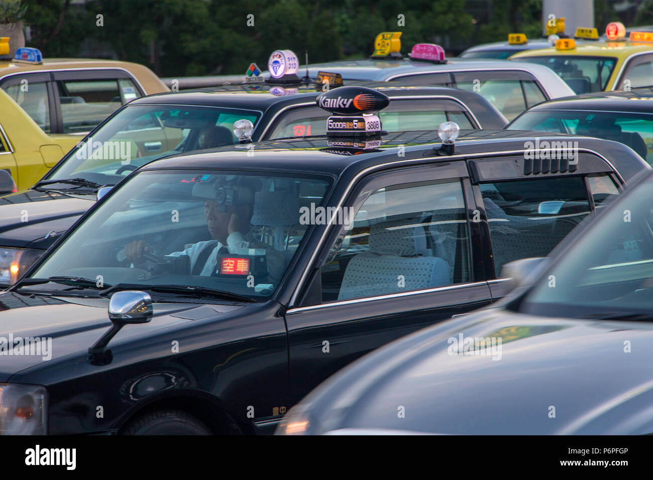 OSAKA, JAPAN, JUL 01 2017, a line of taxis on streets. Many taxi car on
