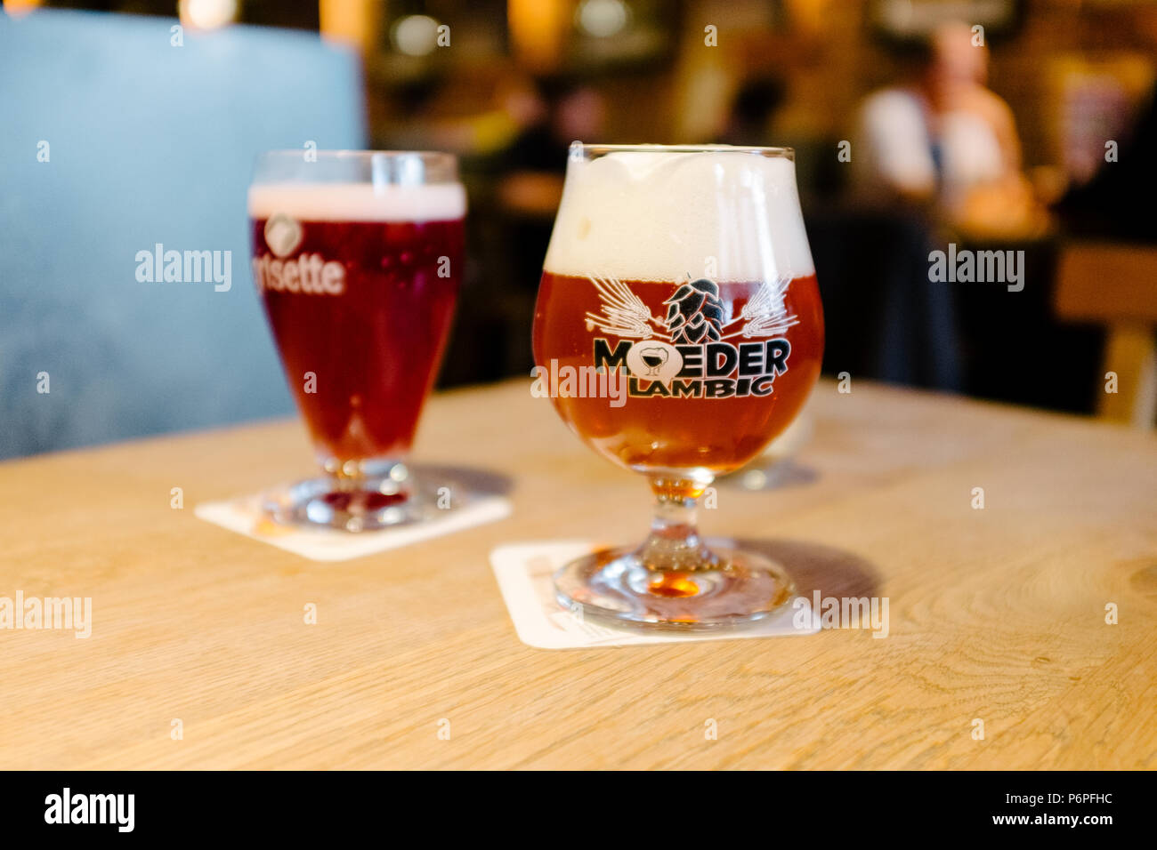 Glasses of beer in the bar Moeder Lambic in central brussels Stock Photo