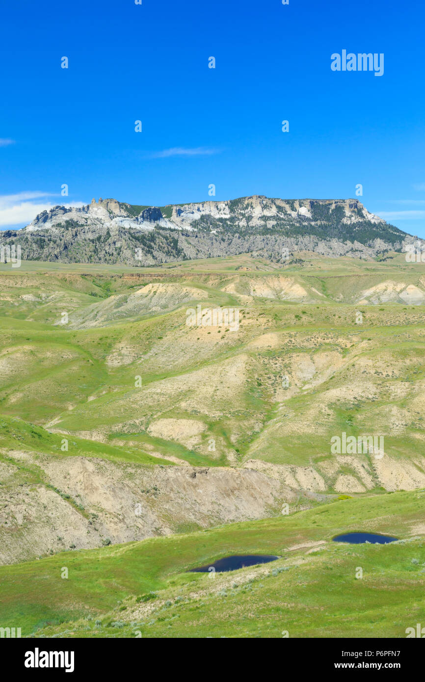 ponds and prairie hills below square butte near geraldine, montana