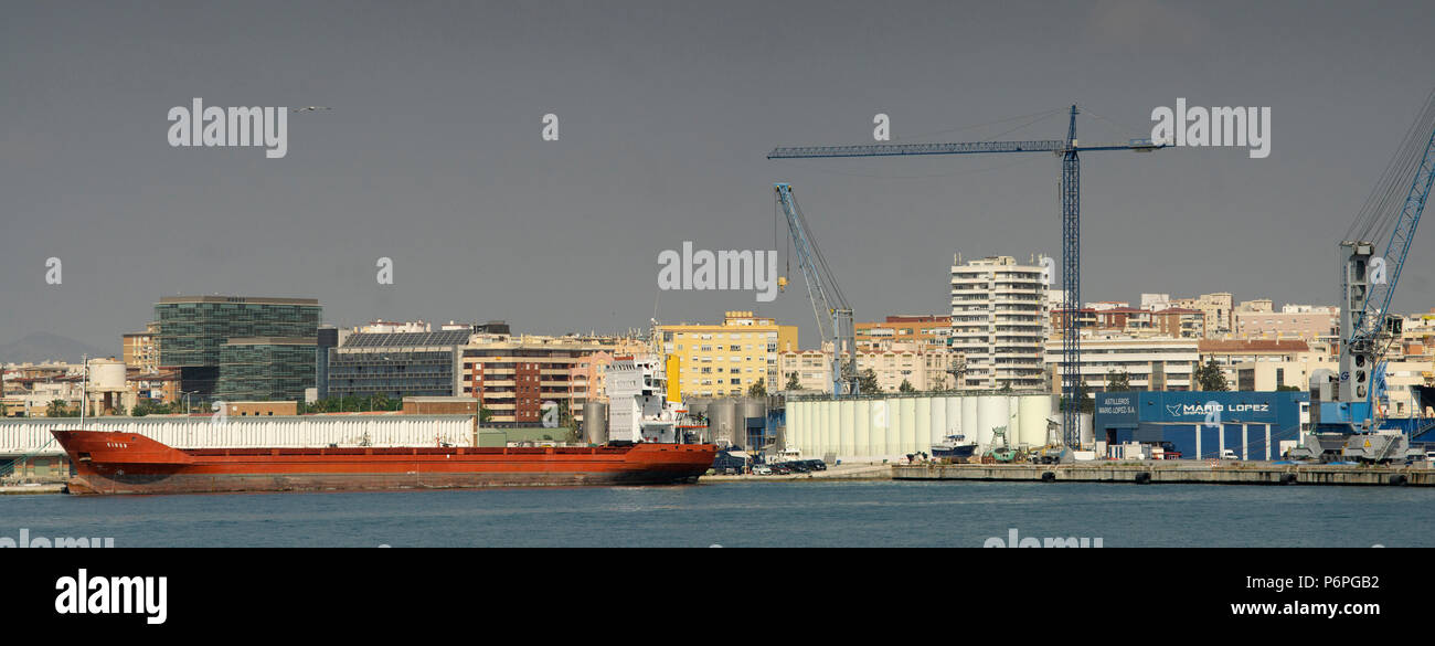 malaga industrial port in spain Stock Photo Alamy