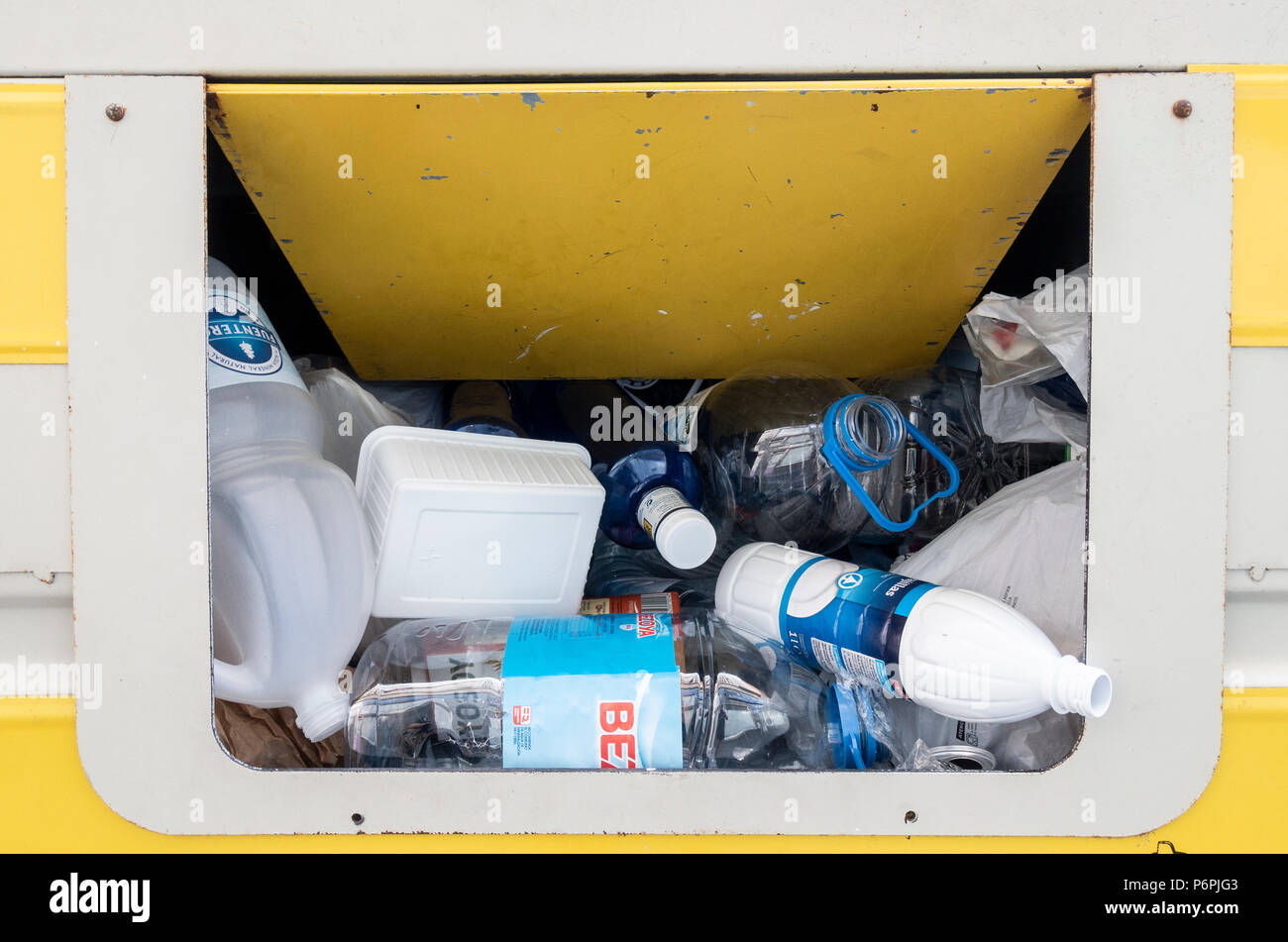 Container for recycling plastic products in street in Spain Stock Photo