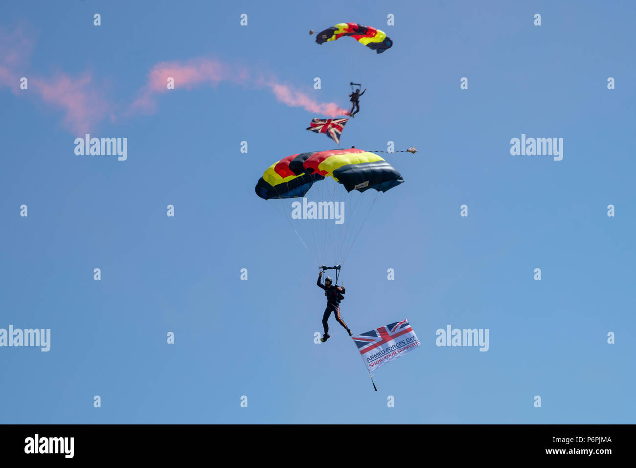 Military Parachute Display at Armed Forces Day Stock Photo