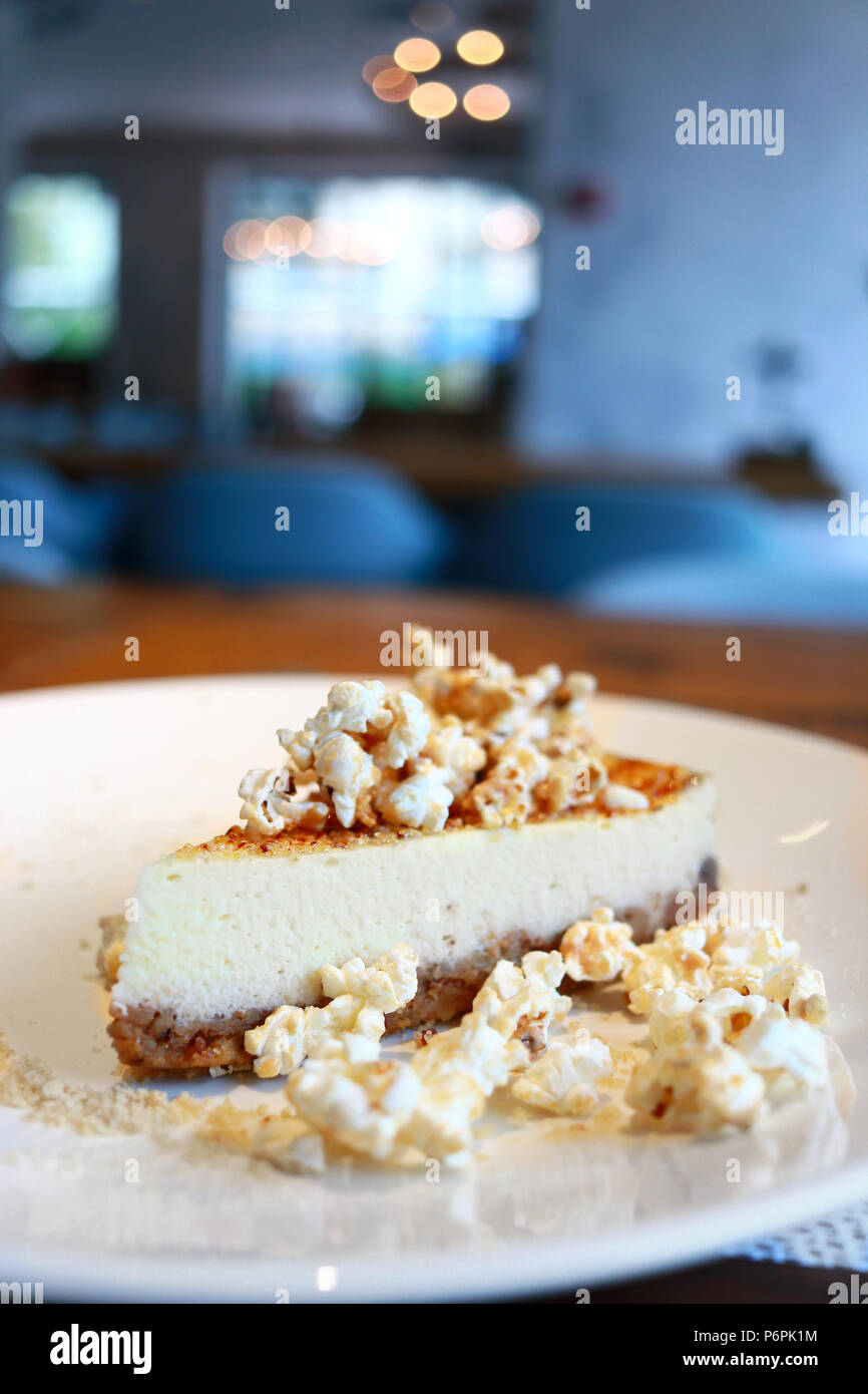 Cheesecake with caramel and popcorn Stock Photo