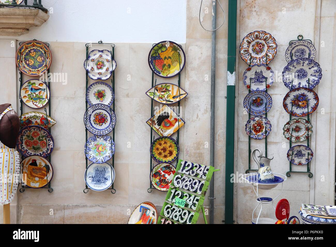 ALCOBACA, PORTUGAL - MAY 22, 2018: Ceramic plates in a souvenir shop in  Alcobaca. 21.2 million tourists visited Portugal in 2016 Stock Photo - Alamy