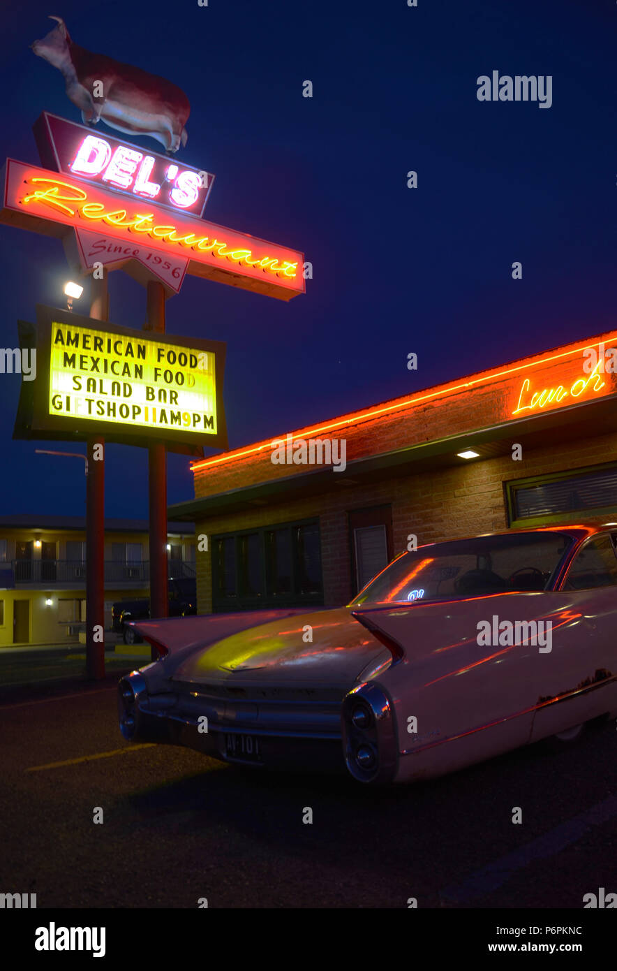 Del's Restaurant Neon and Cadillac Tail Fins Tucumcari NM Stock Photo