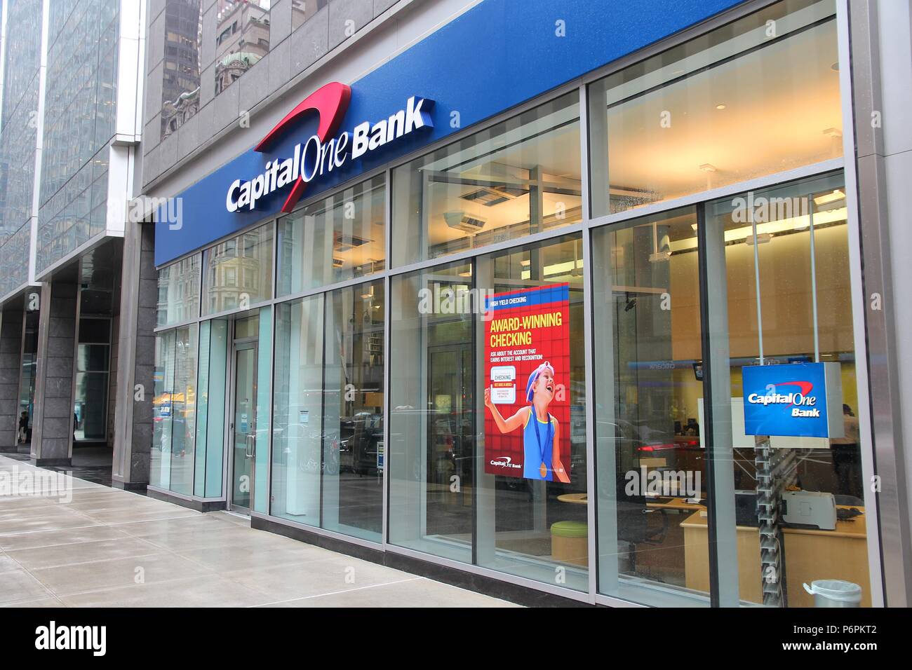 NEW YORK - JUNE 10: Capital One Bank branch on June 10, 2013 in New York. Capital One exists since 1988, employs 39,593 people (2012) and had US$ 21.4 Stock Photo