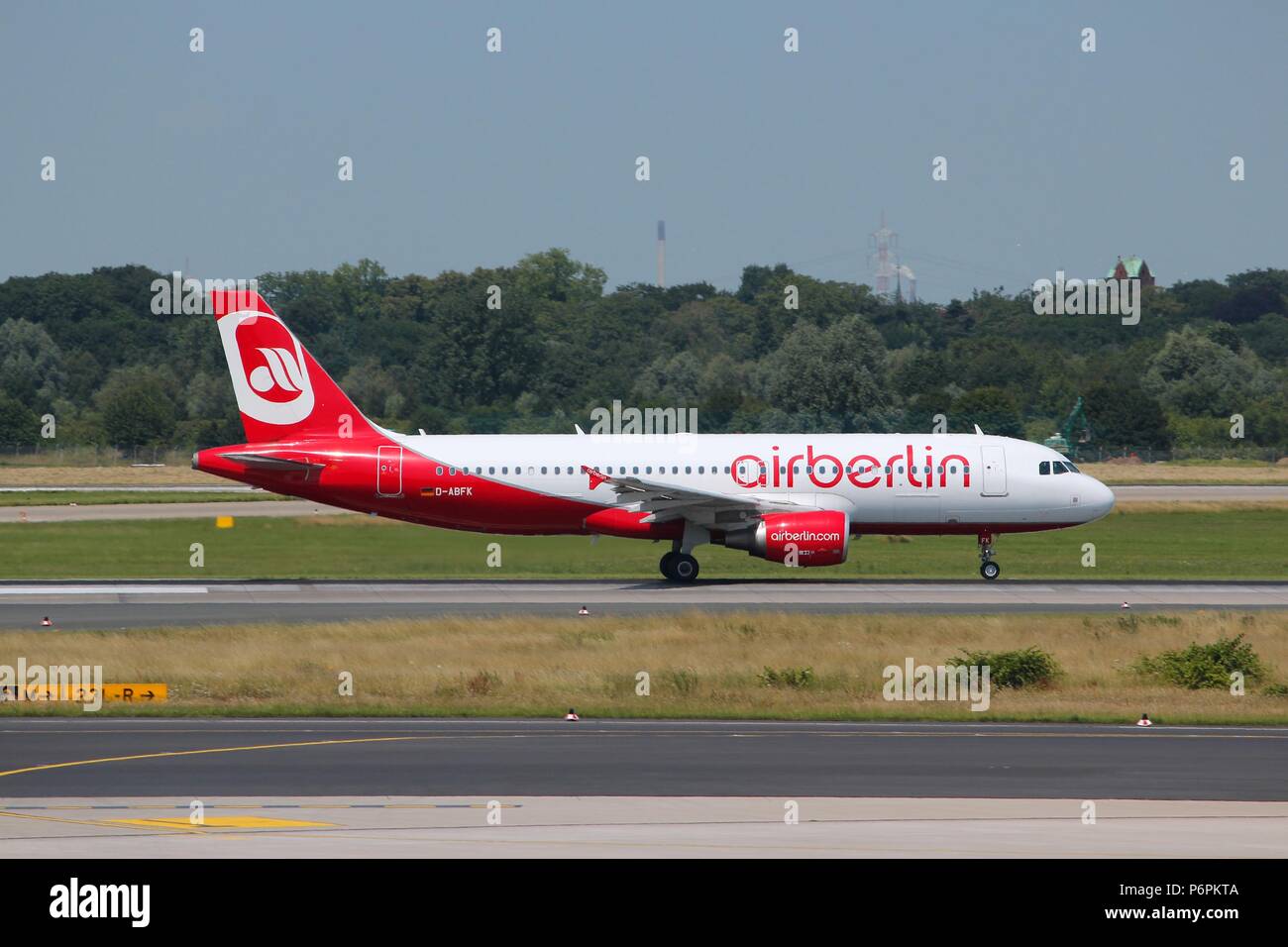 DUSSELDORF, GERMANY - JULY 8: Air Berlin aircraft lands on July 8, 2013 in Dusseldorf Airport, Germany. Air Berlin Group carried more than 33.3 millio Stock Photo