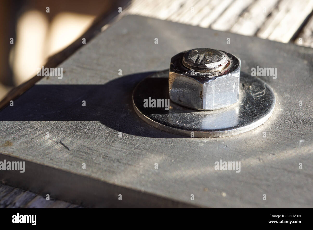 Close up from a rusty square head bolts Stock Photo