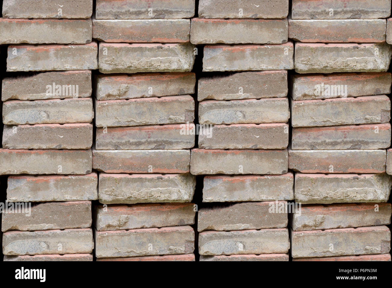 Abstract seamless pattern for designers with old bowlder ciment blocks in piles Stock Photo