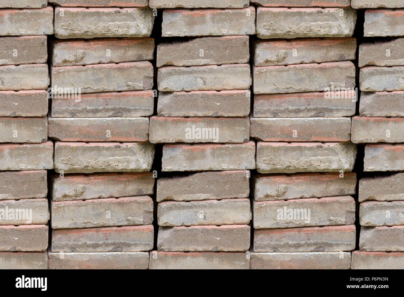 Abstract seamless pattern for designers with old bowlder ciment blocks in piles Stock Photo