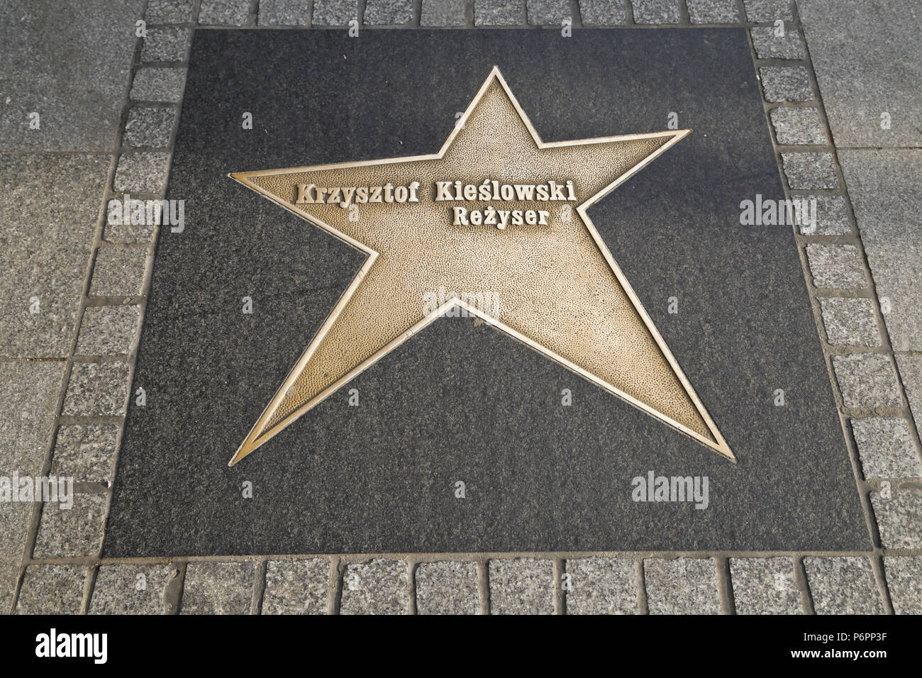 Star of filmdirector Krzysztof Kieslowski at the Lodz Stars Avenue at Piotrkowska street in Lodz, Poland Stock Photo
