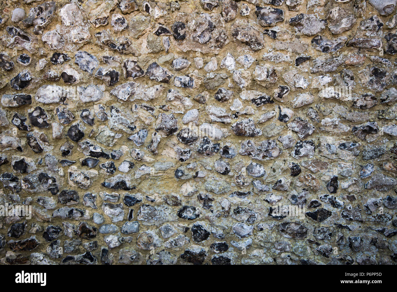 Flint stone construction of wall built by craftsmen in Pevensey, East